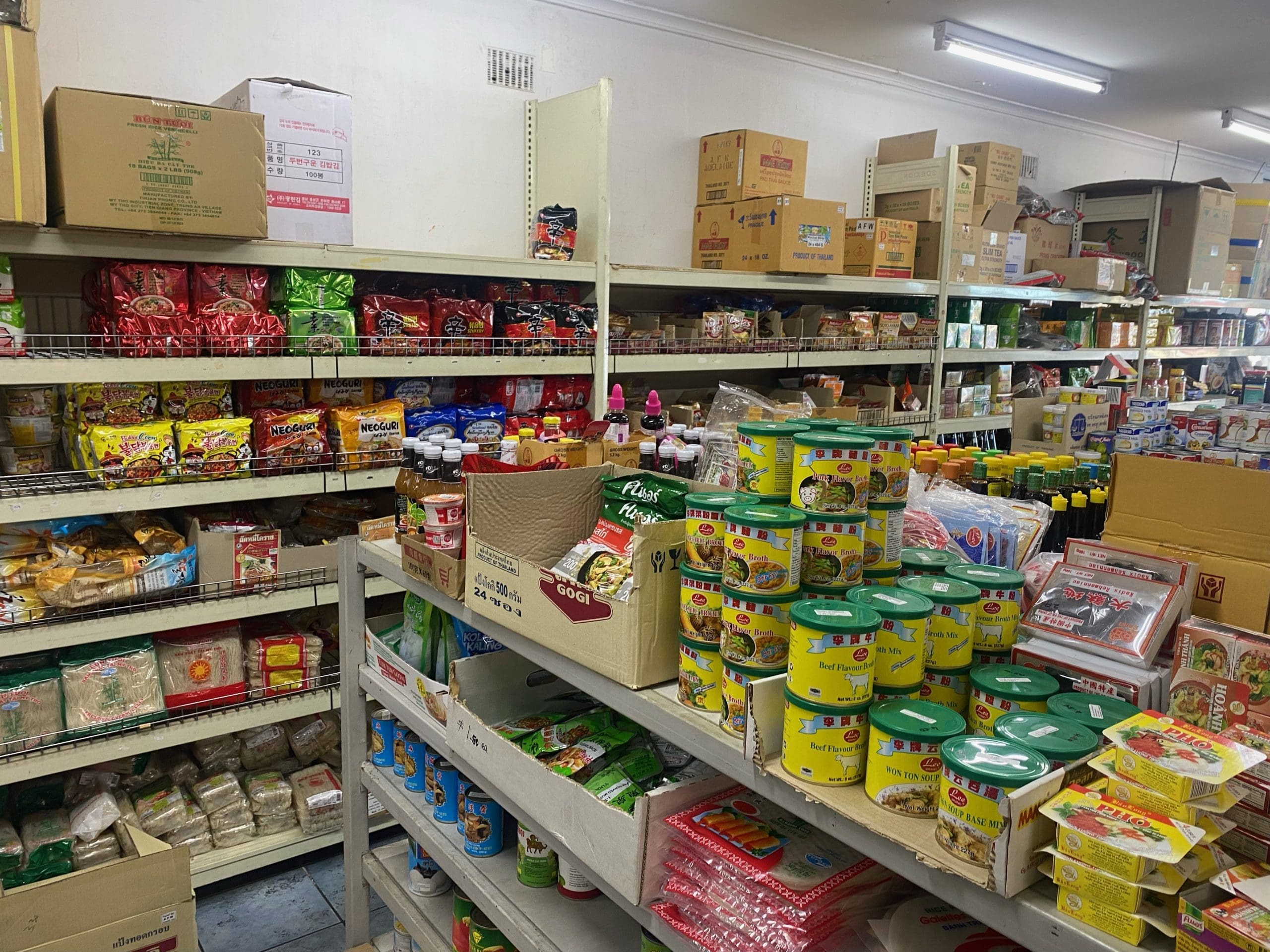 shelves with merchandise at asian grocer