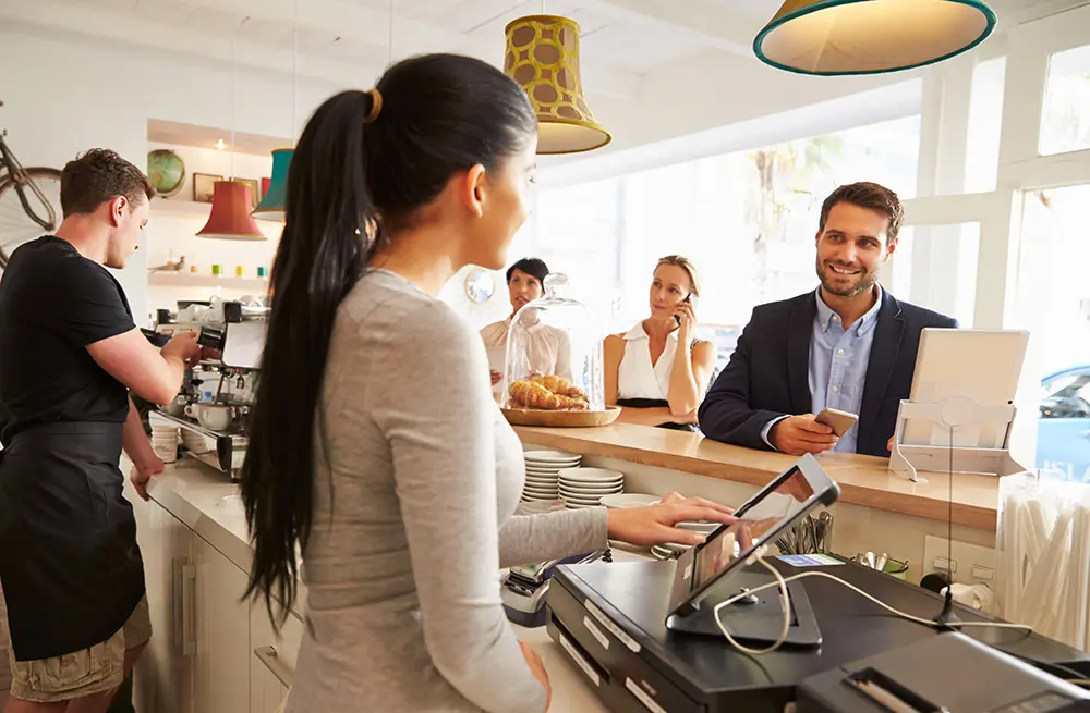 customer ordering at cafe