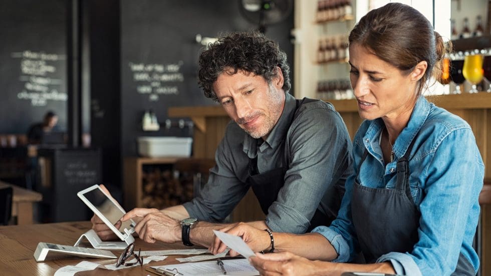 2 people looking at documents