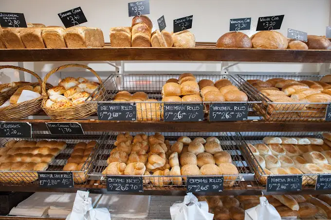 Assorted breads in racks