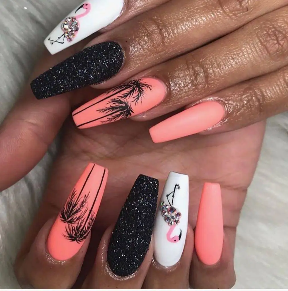 close up of nails with acrylic designs
