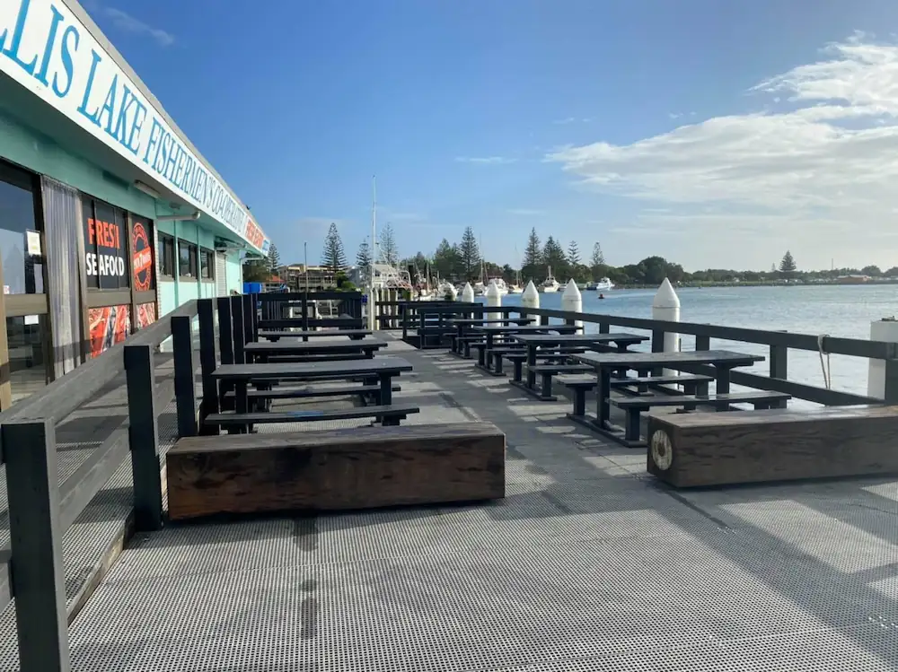 chairs and fish shop by ocean